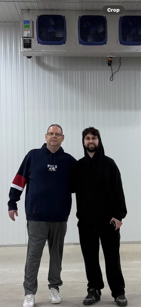 Dominic and Antonio Moceri, fourth and fifth generation, in the cooler